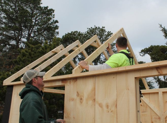 ph_two men building shed